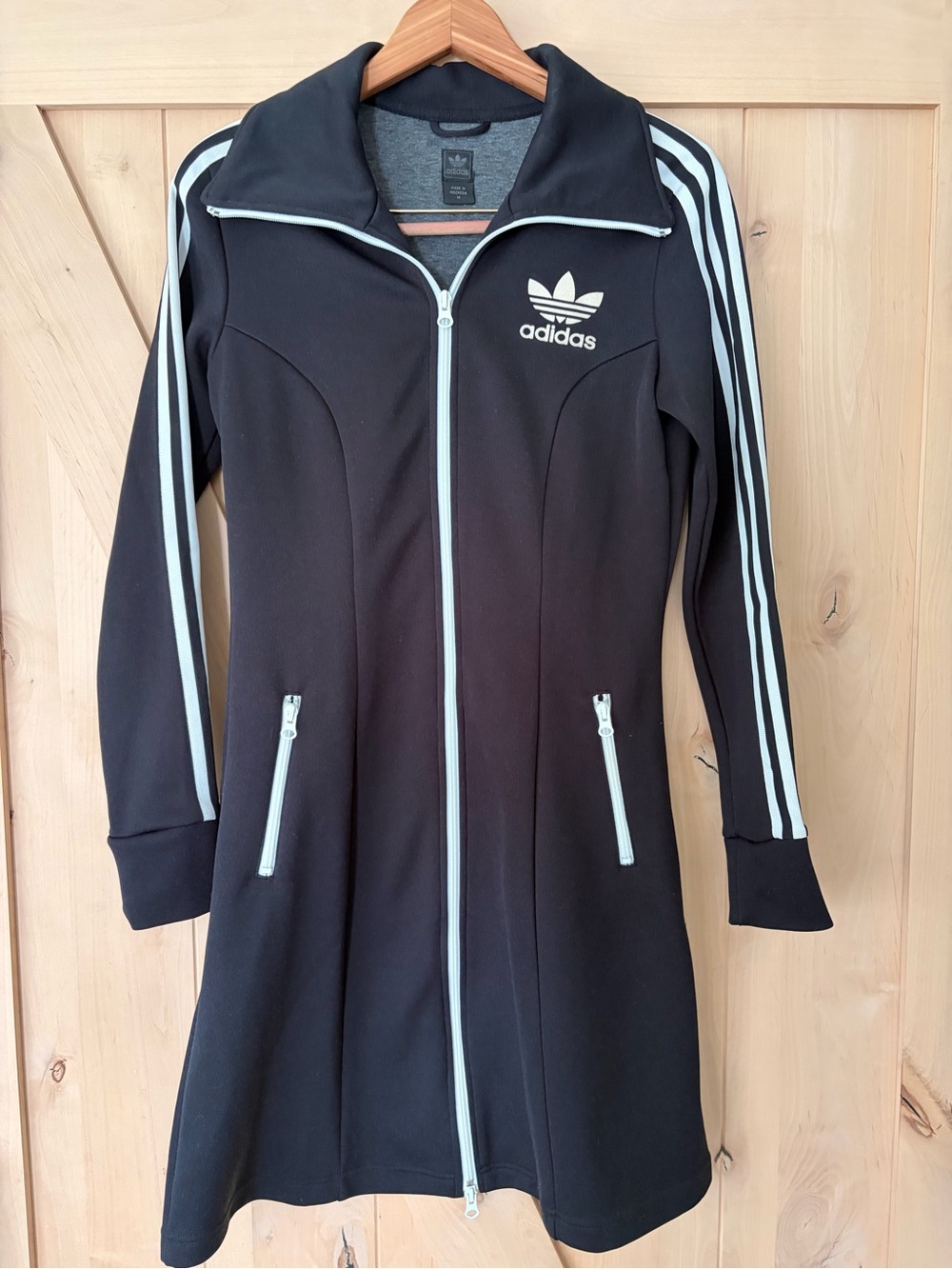 Vintage adidas Women's Black Track Jacket Dress with White Stripes.
